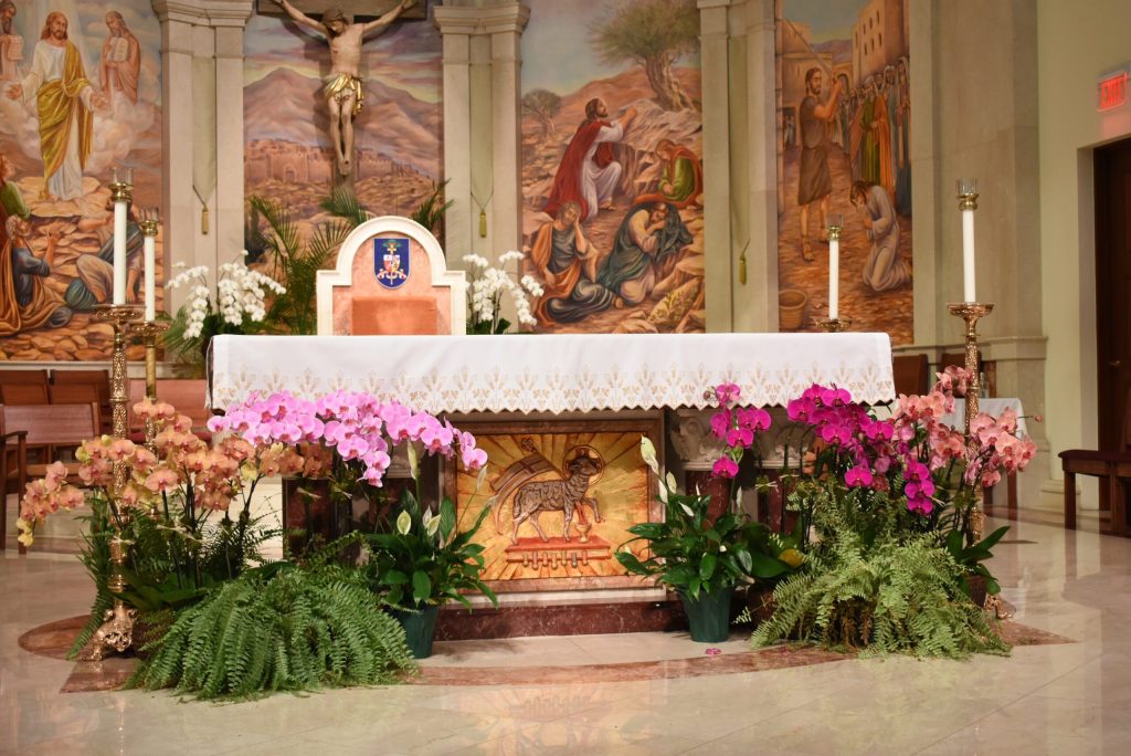 St. James Cathedral Altar with pink, purple and orange orchids